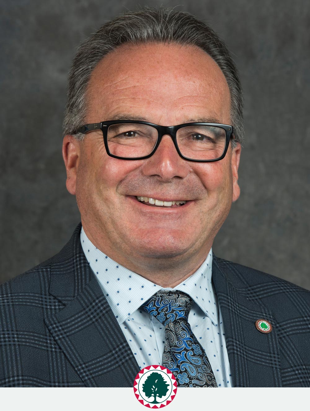 FNTC-Commissioner-Ken-Marsh-portrait-badged
